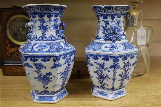 A pair of Chinese blue and white hexagonal vases, 19th century, 20.5cm (a.f.)